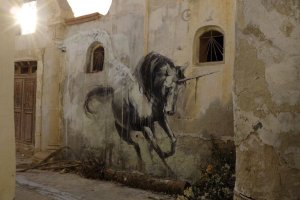 Hunt-Her-Street-Art-by-Faith47-in-Tunisia2-600x400.jpg