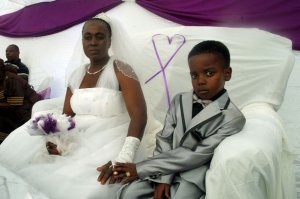 8-Year-Old-Sanele-Masilela-marries-his-61-year-old-bride-Helen-Shabangu-at-their-wedding-ceremon.jpg