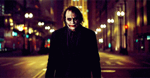 Joker-Tosses-Knife-to-Other-Hand-The-Dark-Knight.gif