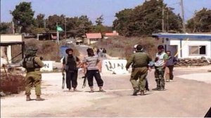3 jabhat al nosra talking with israeli army.JPG