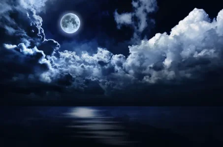 full-moon-in-night-sky-over-water.jpg