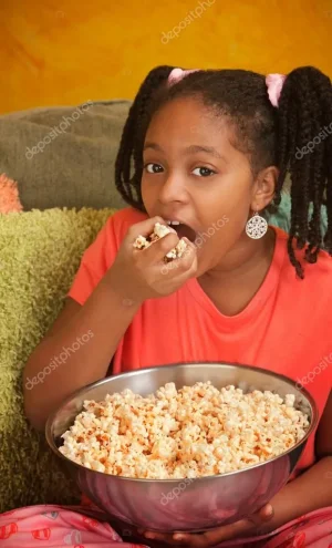 depositphotos_40721211-stock-photo-little-girl-eats-popcorn.jpg