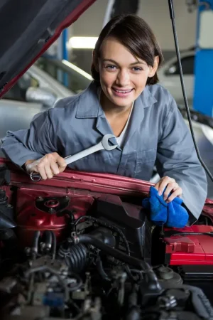 female-mechanic-servicing-car_1170-1517.jpg