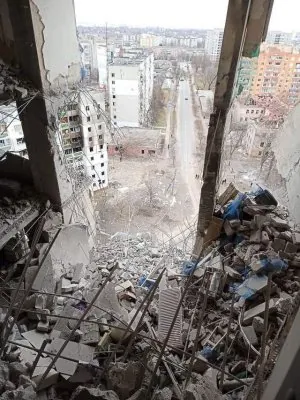 residential apartment, after it and the surrounding street was all severely damaged by Russian...jpg