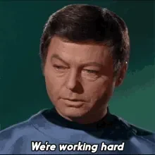 were-working-hard-dr-leonard-mccoy.gif