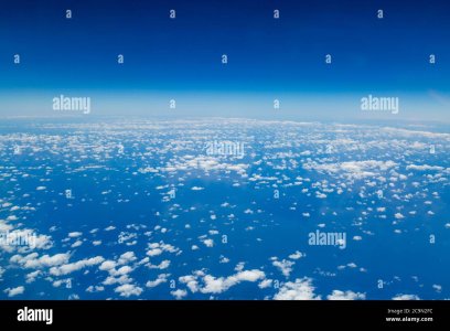 une-vue-des-nuages-et-la-courbure-de-la-terre-prise-de-la-plate-forme-aerienne-d-un-avion-2c9n...jpg