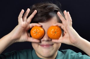child-with-clementines.jpg